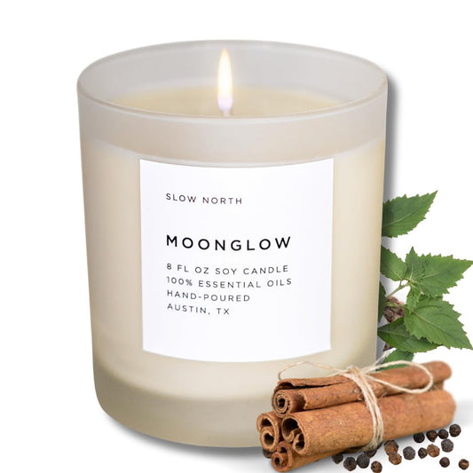 Slow North Moonglow candle in a reusable frosted jar for eco-friendly ambience.
