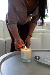 Slow North candle in a glass jar demonstrates premium, hand-poured quality from a USA-based maker.