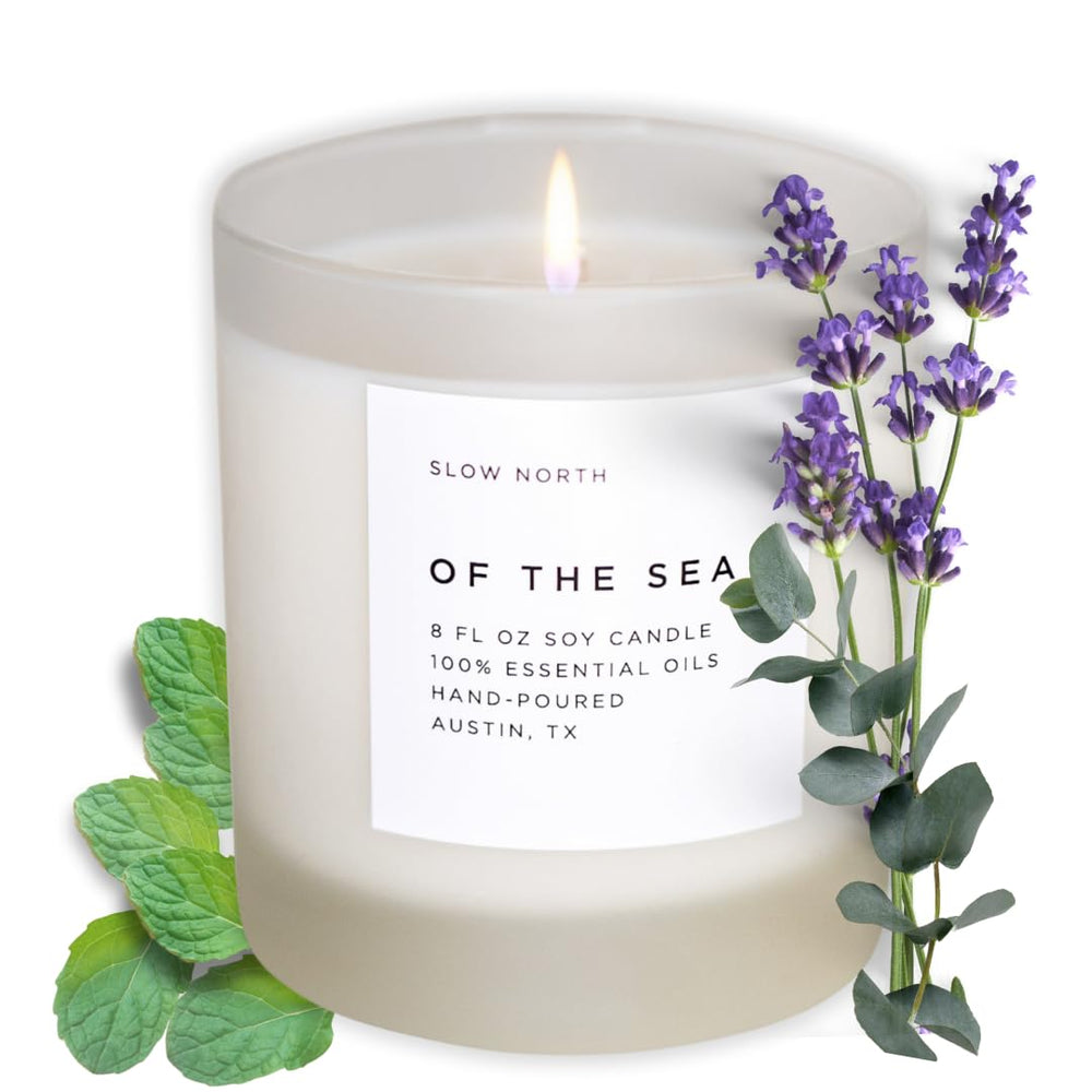 Slow North Sea Candle in a frosted glass jar creates a calming living room ambiance.