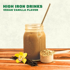 Smart Eats Iron Powder being poured into a glass for smooth mixing.