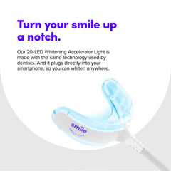 At-home whitening session using SmileDirectClub LED light.