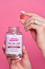 Snana Oh My Glow jar on bathroom counter, convenient beauty supplement.