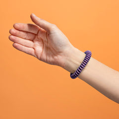 SOULSATION bracelet close-up in resealable pouch, designed for easy on-the-go storage.