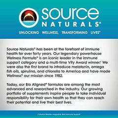 Person holding Source Naturals Acetyl L-Carnitine tablets for daily use