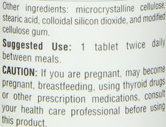 Source Naturals Guggulsterones tablets with water, easy daily use.