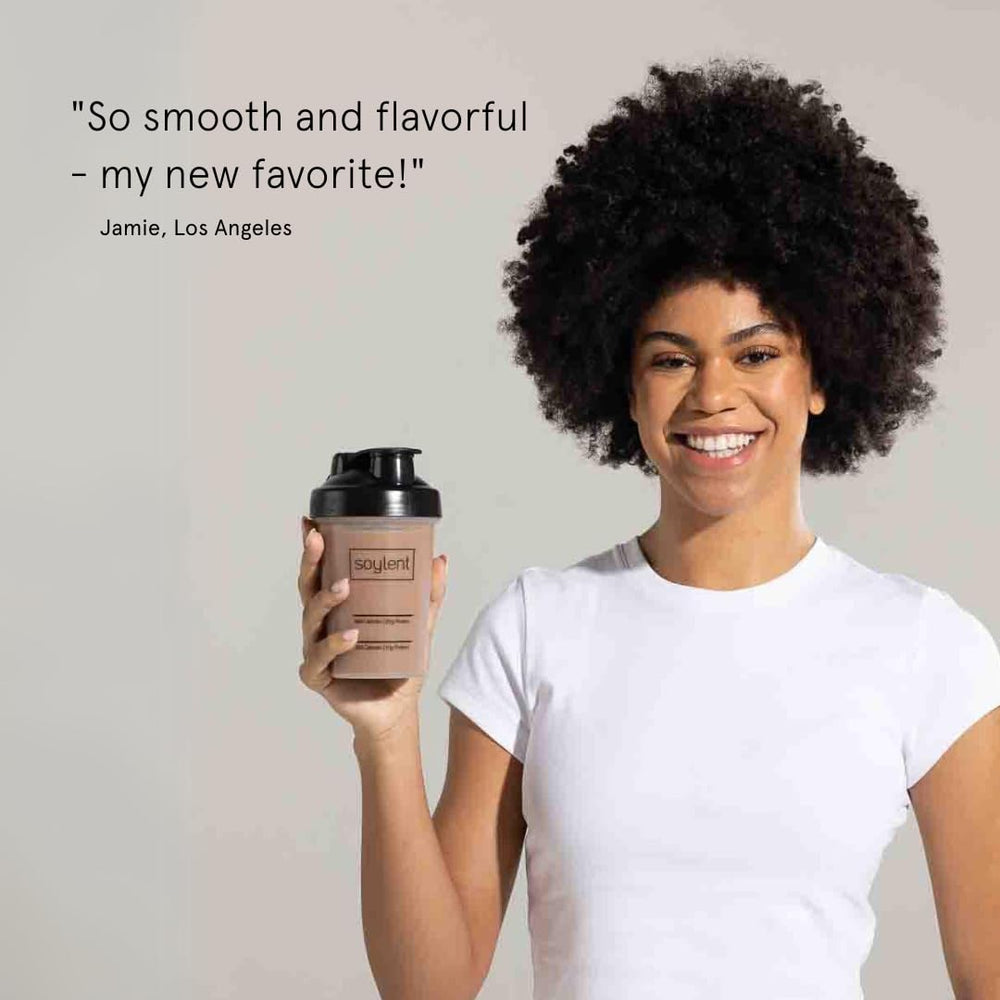 Creamy Soylent Chocolate shake in glass after a workout or busy day.