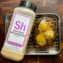 Spiceology Shiitake Mushroom Powder spoon ready-to-use for flavor boosts.