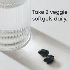 Bottle label indicates vegan-friendly, gluten-free, and non-GMO formulation.