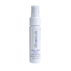 Sprayology Hair + Nail Tonic bottle close-up highlighting natural ingredients for healthy hair and nails