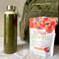SPRIGS Daily Super Greens Berry Blast scoop showing quick, low-sugar mix.