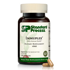 Standard Process Immuplex bottle with label showing daily immune support capsules