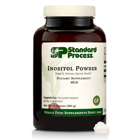 Standard Process Inositol Powder bottle on a kitchen counter for daily wellness.