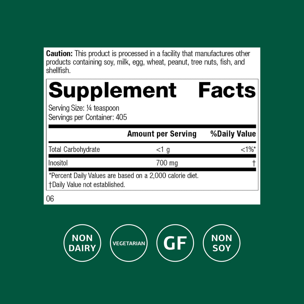 Standard Process Inositol Powder scoop pouring into a glass for easy shake use.