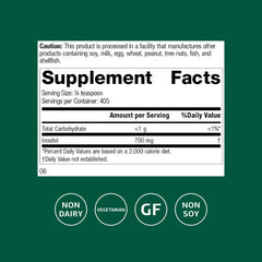 Standard Process Inositol Powder scoop pouring into a glass for easy shake use.