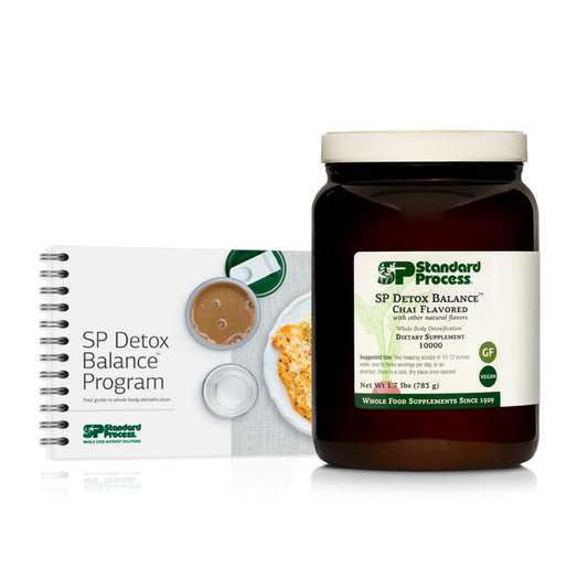 Standard Process SP Detox Balance Chai bottle on kitchen counter supports natural detox.