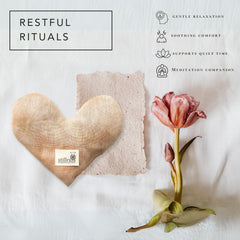 Stillnus heart eye pillow weighted design supports relaxed focus during rest and meditation.