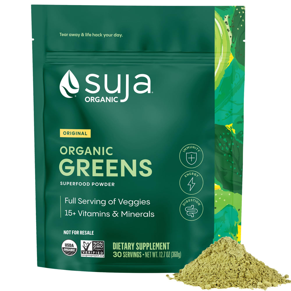 Suja Organic Greens Powder bag beside a glass, suggesting daily energy support.