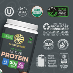 Sunwarrior measuring spoon dispensing powder for precise serving.