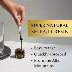 Super Natural Goods shilajit resin amber appearance under light.