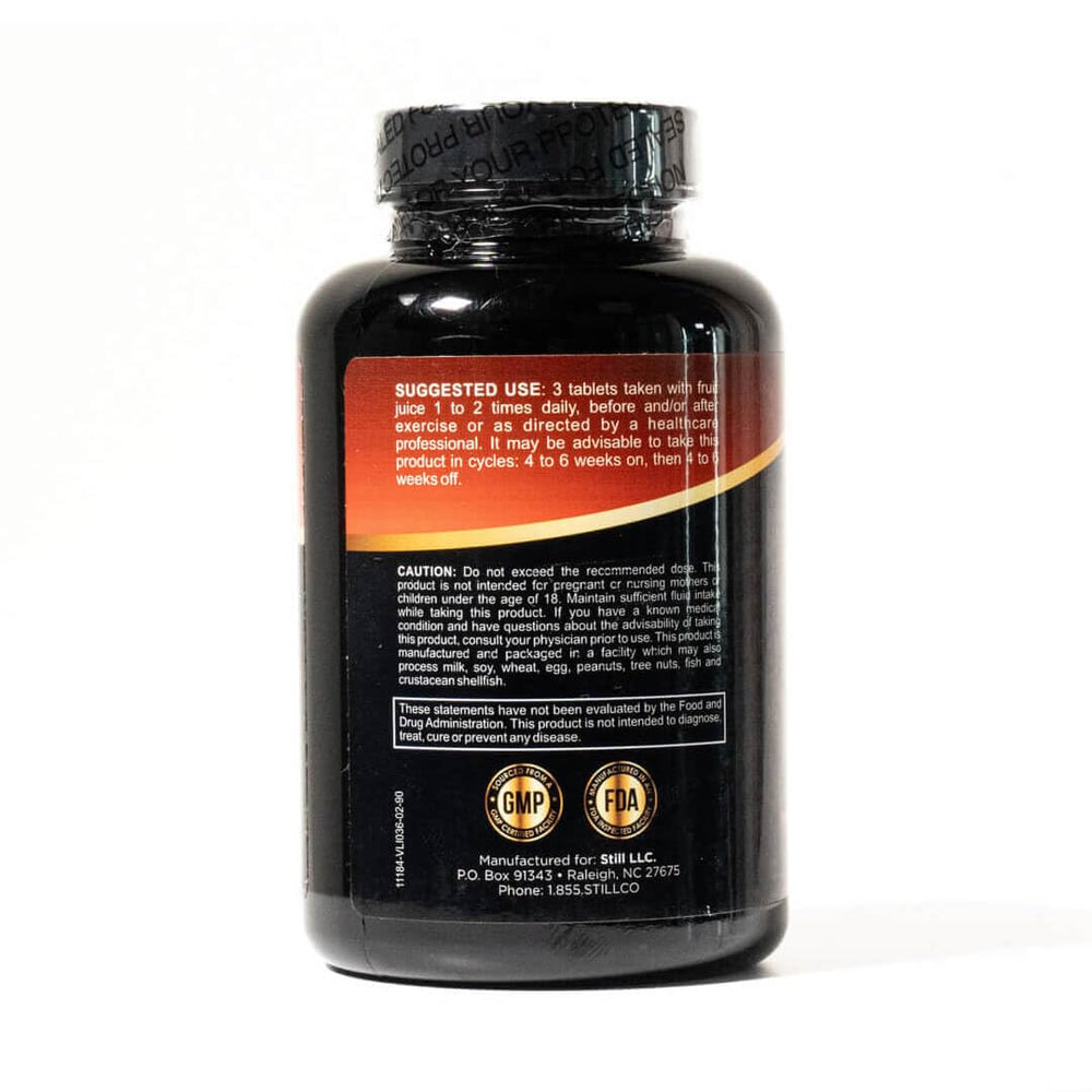 Super Premium Tri-Phase Creatine bottle back shows dosage and USA-made badge.