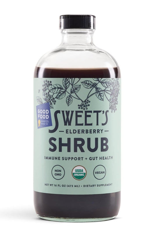 Sweet's Elderberry Shrub bottle on shelf highlights USDA Organic quality and clean ingredients.