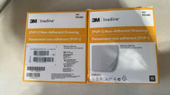 Systagenix Inadine dressing applied to wound with non-adherent contact and iodine coverage.