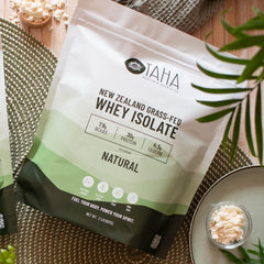 Taha Health & Nutrition whey isolate powder close-up, pure and clean for versatile mixability.