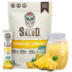 Taste Salud pineapple hydration packet ready to mix for on-the-go refreshment.