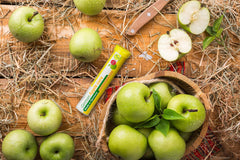 T&D German Apple Cure dissolving tablet close-up with apple flavor.