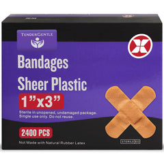 TenderGentle adhesive bandage close-up on skin showing flexible fabric for minor wounds.