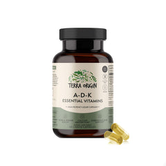 Terra Origin ADK bottle on wood showing immune and bone support formula.