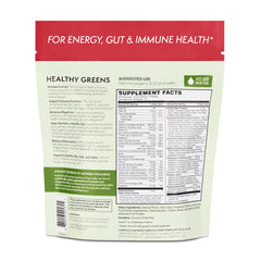Fresh kiwi and strawberry beside Terra Origin greens packets for flavor context