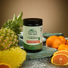 TERRA ORIGIN greens scoop beside packaging, convenient daily dose