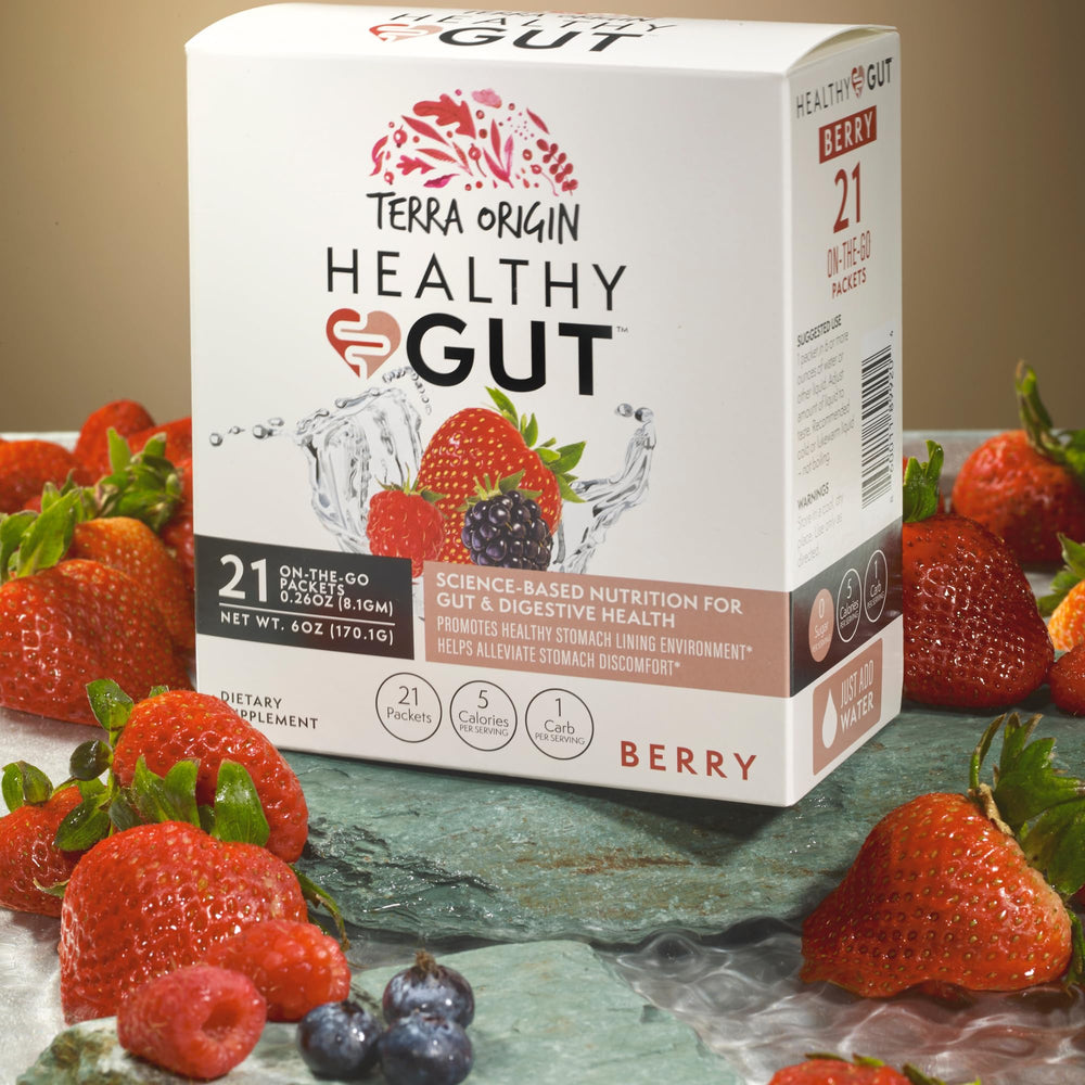 Berry-flavored Terra Origin sticks highlighting portable digestive support.