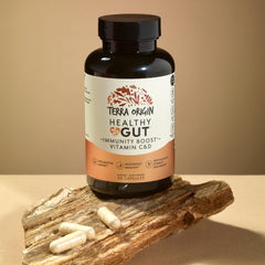 Terra Origin immunity boost capsules close-up featuring vitamins C and D.