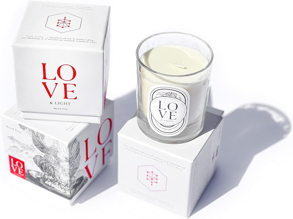 The Kabbalah Centre Wood Fire candle emits earthy warmth for cozy evenings.