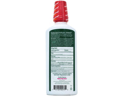 The Natural Dentist Healthy Gums Mouthwash pour demonstrates easy daily use for on-the-go care.
