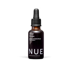 The Nue Co Sleep Drops bottle for a calm, simple bedtime routine.