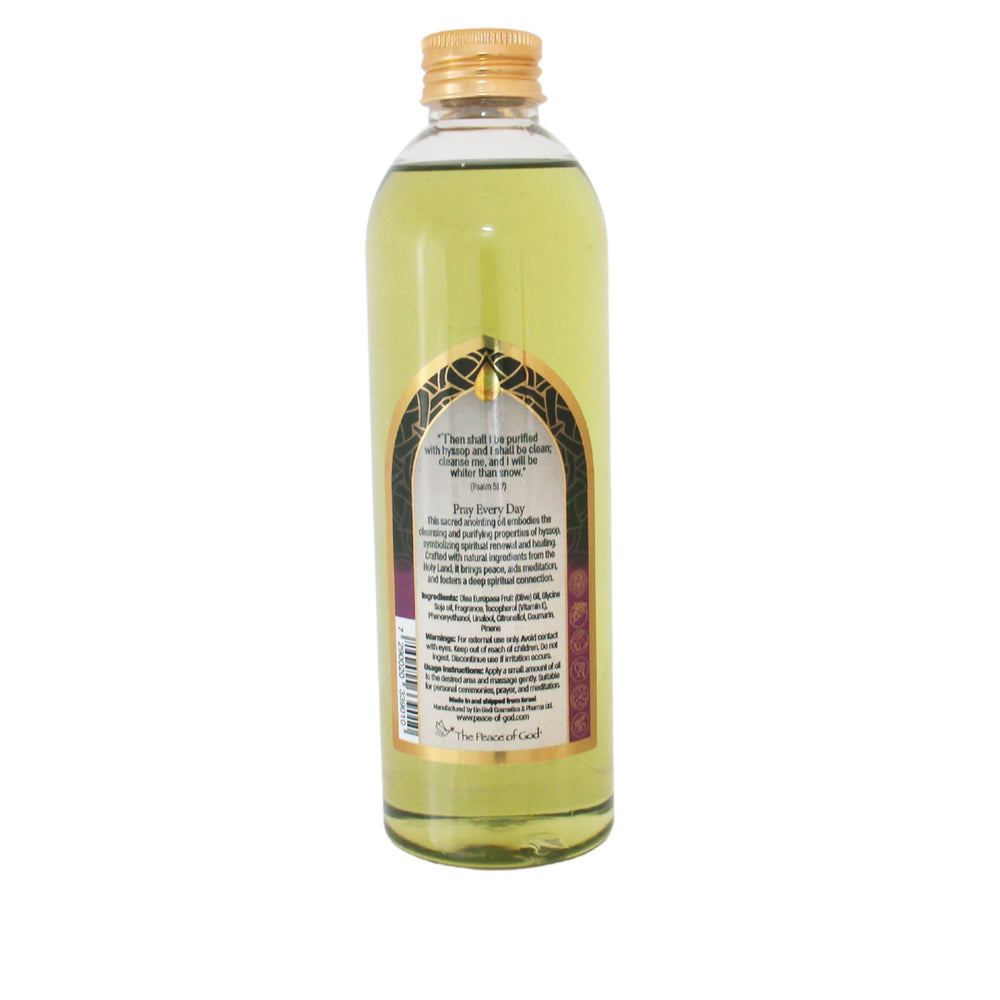 The Peace of God Hyssop oil bottle during anointing ritual for blessing moments.