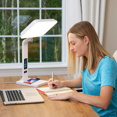 TheraLite Aura Qi Light Lamp emitting glare-free white light for focused tasks