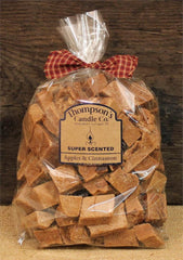 Thompson's Candle Co. Apple & Cinnamon crumbles fill the room with a cozy scent.