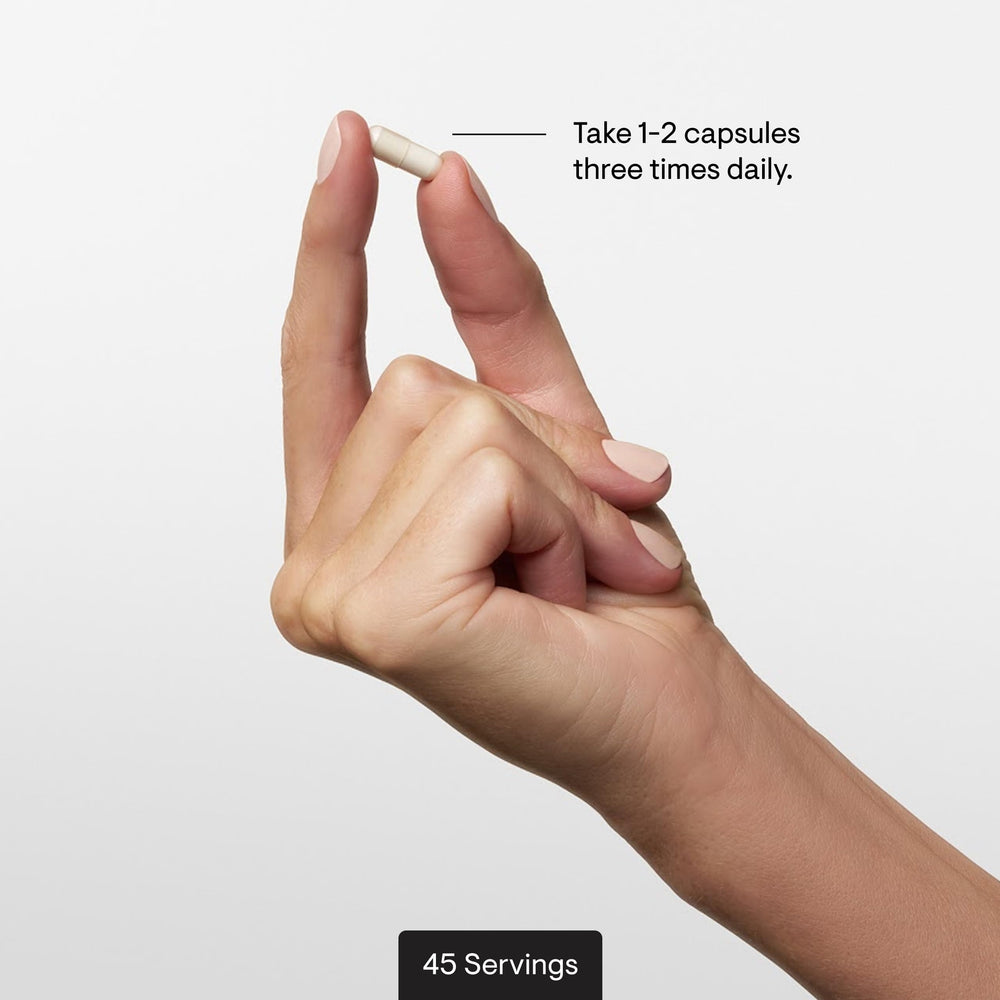A THORNE 5-HTP bottle with a measuring scoop implies easy daily dosing.