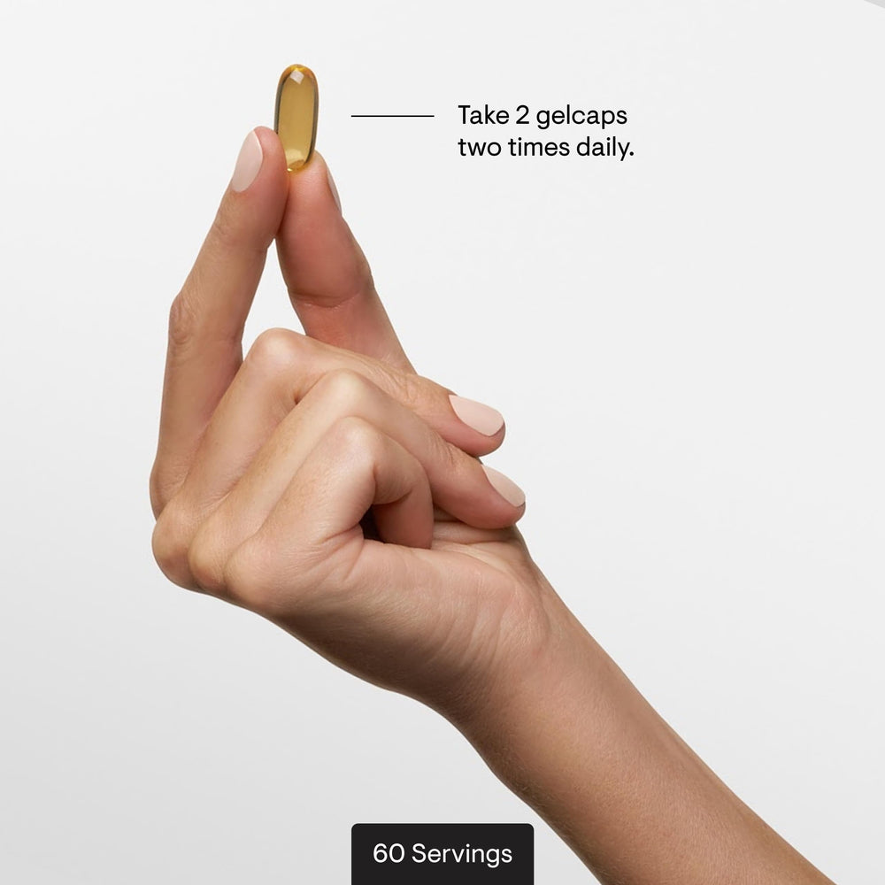 THORNE Super EPA Pro softgels in hand for daily use.