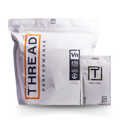 THREAD Performance Daily Fuel bottle with vanilla birthday cake flavor for post-practice fueling.