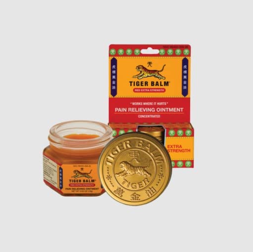 Tiger Balm Red applied on shoulder showing targeted relief for tense muscles