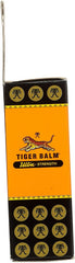 Tiger Balm Ultra Strength on shoulder showing targeted warming application.