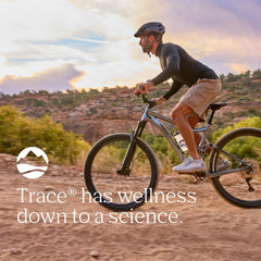 Trace Minerals ConcenTrace bottle with glass suggests morning energy ritual.