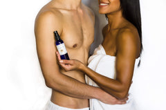 Travertine Spa Steam Shower Spray in-shower usage showing spray direction for lasting scent.
