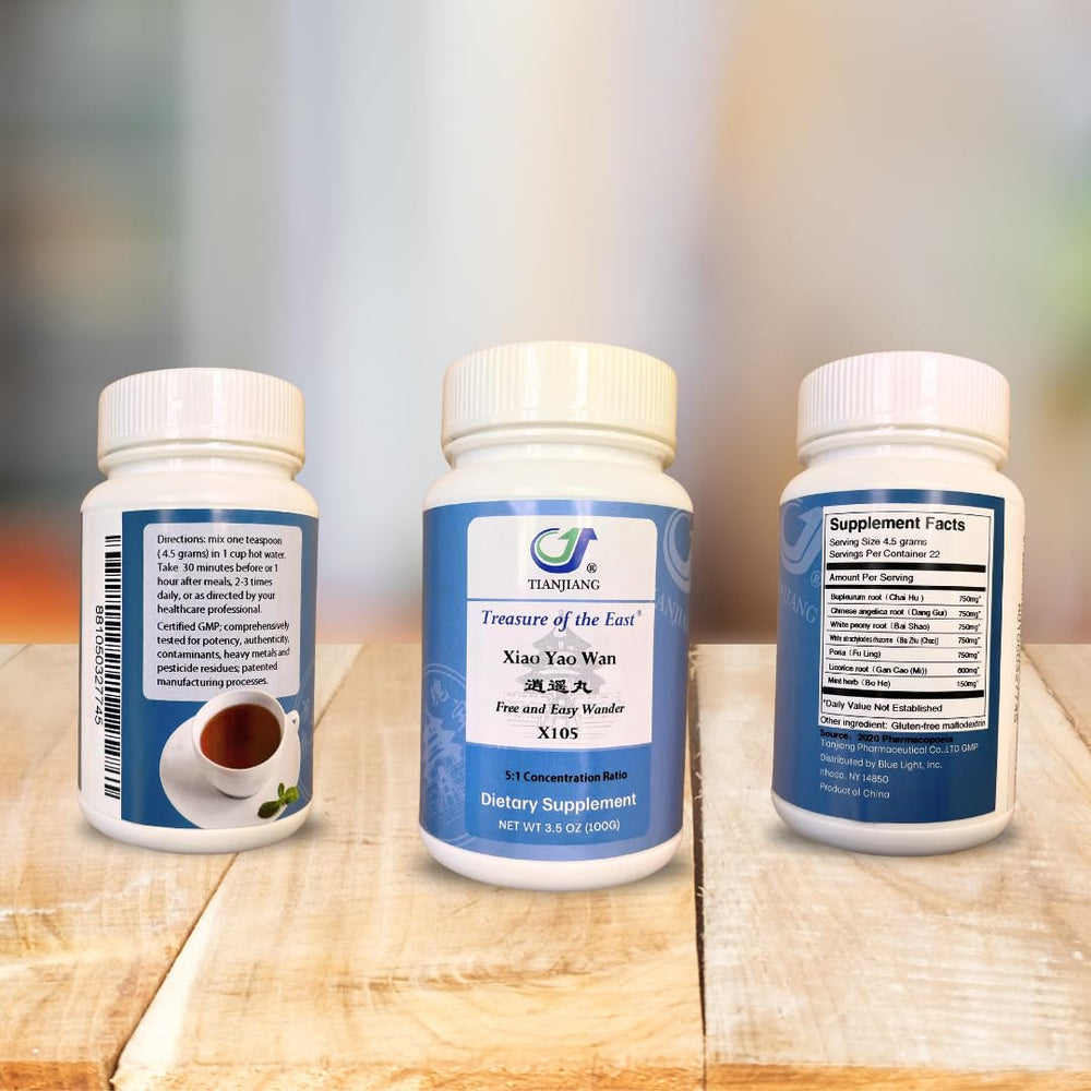 Xiao Yao Wan granules dissolving in warm water for quick daily balance.