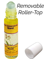 Nard oil roller-top bottle in use during altar prayers.